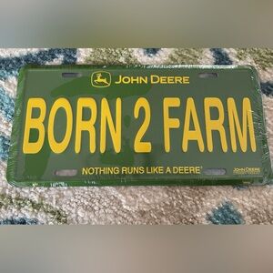 John Deere Green and Yellow Metal License Plate - FARM Slogan